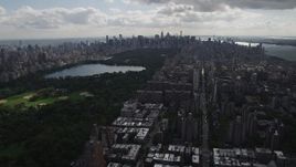 4K aerial stock footage Flying away from Central Park, Upper West Side, New York, New York Aerial Stock Footage | AX87_126
