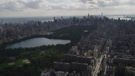4K aerial stock footage Flying by Central Park, seen from Upper West Side, New York, New York Aerial Stock Footage | AX87_129