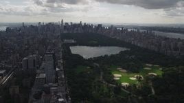 4K aerial stock footage Flying by Central Park, Upper East Side, seen from Harlem, New York, New York Aerial Stock Footage | AX87_132