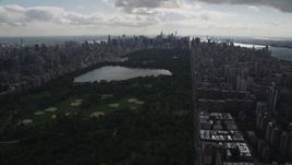 4K aerial stock footage Flying by Central Park, over Upper West Side, New York, New York Aerial Stock Footage | AX87_139