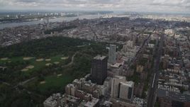 4K aerial stock footage Flying over Upper East Side buildings, Central Park, New York, New York Aerial Stock Footage | AX87_157