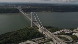 4K aerial stock footage Flying by the George Washington Bridge, Hudson River, New York, New York Aerial Stock Footage | AX87_163