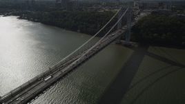 4K aerial stock footage Flying by the George Washington Bridge, Hudson River, New York, New York Aerial Stock Footage | AX87_166
