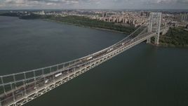 4K aerial stock footage Fly by George Washington Bridge, Hudson River, Washington Heights, New York Aerial Stock Footage | AX87_171