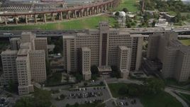 4K aerial stock footage Flying by the Manhattan Psychiatric Center, Wards Island, New York, New York Aerial Stock Footage | AX87_184