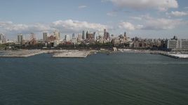 4K aerial stock footage of approaching piers and skyscrapers in Brooklyn, New York Aerial Stock Footage | AX88_001