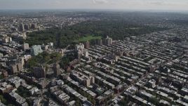 4K aerial stock footage of flying over row houses toward Prospect Park, Grand Army Plaza, Brooklyn, New York Aerial Stock Footage | AX88_015