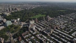 4K aerial stock footage of approach Prospect Park and Grand Army Plaza from row houses, Brooklyn, New York Aerial Stock Footage | AX88_016