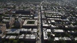 4K aerial stock footage of flying by 8th Avenue Armory and row houses, Brooklyn, New York Aerial Stock Footage | AX88_020
