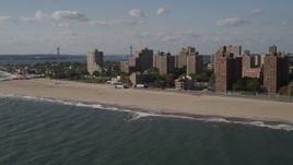 4K aerial stock footage of apartment buildings and Coney Island Beach in Brooklyn, New York Aerial Stock Footage | AX88_065