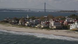 4K aerial stock footage of flying by up0scale beachfront homes in Coney Island, Brooklyn, New York, New York Aerial Stock Footage | AX88_068