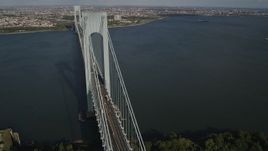 4K aerial stock footage of flying by Verrazano-Narrows Bridge, seen from Staten Island, New York, New York Aerial Stock Footage | AX88_083