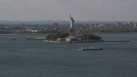 4K aerial stock footage of flying by the front of the Statue of Liberty, New York, New York Aerial Stock Footage | AX88_101