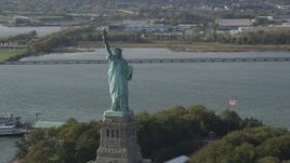 4K aerial stock footage of flying by the front of the Statue of Liberty, New York, New York Aerial Stock Footage | AX88_104