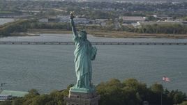 4K aerial stock footage of flying by the front side of the Statue of Liberty, New York, New York Aerial Stock Footage | AX88_107