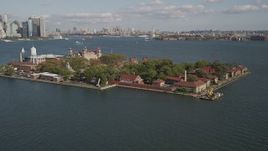 4K aerial stock footage of flying by historic Ellis Island, New York, New York Aerial Stock Footage | AX88_112