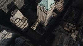 4K aerial stock footage of a bird's eye view of 40 Wall Street in Lower Manhattan, New York, New York Aerial Stock Footage | AX88_119