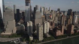 4K aerial stock footage of passing World Trade Center skyscrapers near the river in Lower Manhattan, New York Aerial Stock Footage | AX88_151