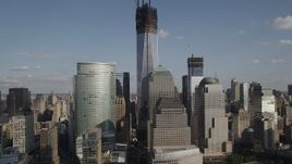 4K aerial stock footage of a view of World Trade Center skyscrapers and Freedom Tower, Lower Manhattan, New York Aerial Stock Footage | AX88_152