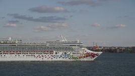 4K aerial stock footage of tracking a cruise ship as it sails New York Harbor, New York, New York Aerial Stock Footage | AX88_187