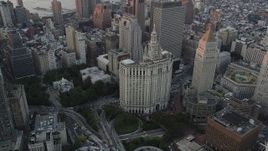4K aerial stock footage Flying by Manhattan Municipal Building, Lower Manhattan, New York, sunset Aerial Stock Footage | AX89_008