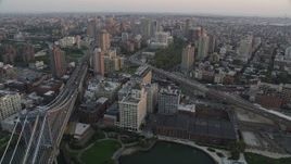 4K aerial stock footage Flying by Brooklyn, Manhattan Bridge, New York, New York, sunset Aerial Stock Footage | AX89_011