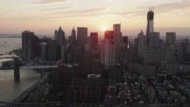 4K aerial stock footage Flying by Lower Manhattan skyscrapers, New York, New York, sunset Aerial Stock Footage | AX89_013