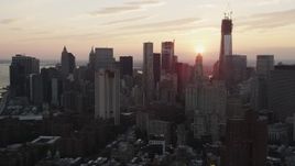 4K aerial stock footage Flying by Lower Manhattan skyline, New York, New York, sunset Aerial Stock Footage | AX89_014