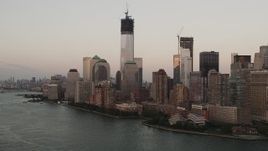 4K aerial stock footage of One World Trade Center, One World Financial Center, Lower Manhattan, New York, sunset Aerial Stock Footage | AX89_021
