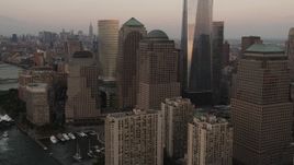 4K aerial stock footage of World Trade Center Memorial, Two World Trade Center, Lower Manhattan, New York, sunset Aerial Stock Footage | AX89_023
