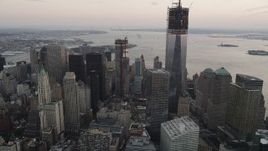 4K aerial stock footage Flying by Four World Trade Center, Lower Manhattan, New York, New York, sunset Aerial Stock Footage | AX89_028