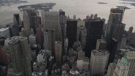 4K aerial stock footage Flying by Lower Manhattan skyscrapers, New York, New York, twilight Aerial Stock Footage | AX89_030