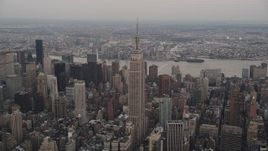 4K aerial stock footage Approaching Empire State Building, Midtown Manhattan, New York, twilight Aerial Stock Footage | AX89_043