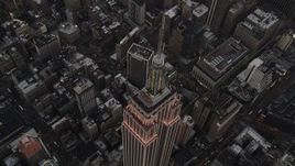 4K aerial stock footage of a Bird's eye view over Empire State Building, Midtown Manhattan, New York, twilight Aerial Stock Footage | AX89_050