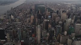 4K aerial stock footage Approaching Midtown Manhattan skyscrapers, New York, New York, twilight Aerial Stock Footage | AX89_052