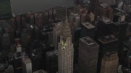 4K aerial stock footage Flying by the Chrysler Building, Midtown Manhattan, New York, New York, twilight Aerial Stock Footage | AX89_055