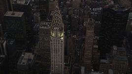 4K aerial stock footage Flying by Chrysler Building, Midtown Manhattan, New York, New York, twilight Aerial Stock Footage | AX89_056