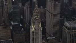 4K aerial stock footage Flying by the Chrysler Building, Midtown Manhattan, New York, New York, twilight Aerial Stock Footage | AX89_060