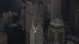 Flying by the Chrysler Building, Midtown Manhattan, New York, New York, twilight Aerial Stock Footage | AX89_061