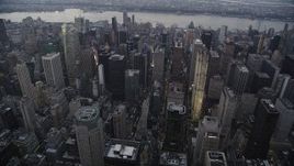 4K aerial stock footage Flying by skyscrapers, Midtown Manhattan, New York, New York, twilight Aerial Stock Footage | AX89_064