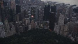 4K aerial stock footage Flying by Columbus Circle, Midtown Manhattan, New York, New York, twilight Aerial Stock Footage | AX89_068
