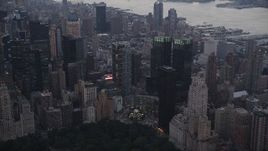 4K aerial stock footage Flying by Columbus Circle, revealing Times Square, New York, New York, twilight Aerial Stock Footage | AX89_069