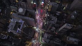 4K aerial stock footage Bird's eye view over Times Square, Midtown Manhattan, New York, twilight Aerial Stock Footage | AX89_085