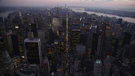 4K aerial stock footage Approaching Midtown Manhattan, New York, New York, twilight Aerial Stock Footage | AX89_093