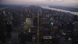4K aerial stock footage Approaching Midtown Manhattan, reveal Times Square, New York, twilight Aerial Stock Footage | AX89_094