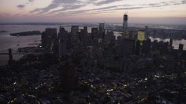 4K aerial stock footage Flying by Lower Manhattan, seen from Lower East Side, New York, twilight Aerial Stock Footage | AX89_104