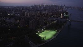 4K aerial stock footage Approaching Midtown Manhattan, from Lower East Side, New York, twilight Aerial Stock Footage | AX89_110