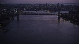 4K aerial stock footage Approaching the Williamsburg Bridge, East River, New York, New York, twilight Aerial Stock Footage | AX89_116