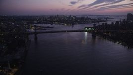 4K aerial stock footage Approaching Williamsburg Bridge, East River, New York, New York, twilight Aerial Stock Footage | AX89_117