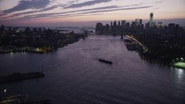 4K aerial stock footage Flying by Lower Manhattan, Manhattan Bridge, East River, New York, twilight Aerial Stock Footage | AX89_119